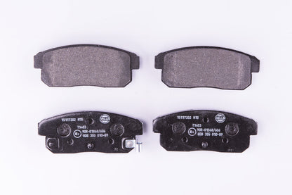 HELLA Brake pad set - T1403 - for e.g. MAZDA / NISSAN 8DB355010-891
