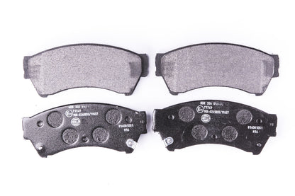 HELLA Brake pad set - T1749 - for e.g. LINCOLN / MAZDA 8DB355013-761