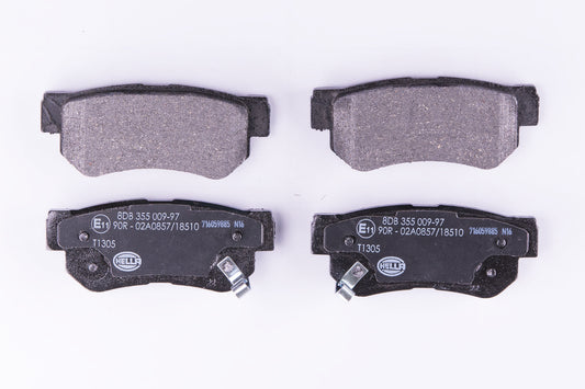 HELLA Brake pad set - T1305 - for e.g. HYUNDAI / KIA 8DB355009-971